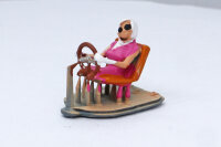 3D printed female driver figure wearing a headscarf type...